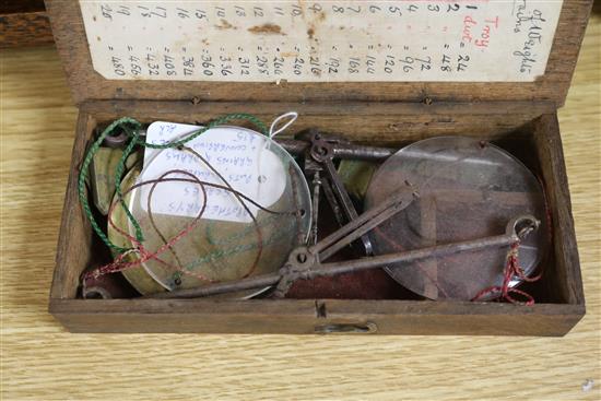 A set of postal scales and a set of apothecary scales